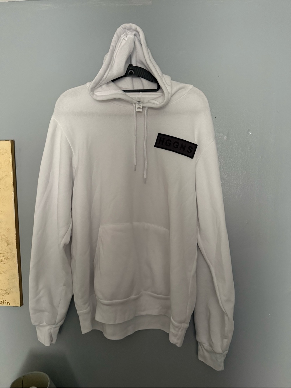 H&M White Pullover Hoodie with Black Chest Patch